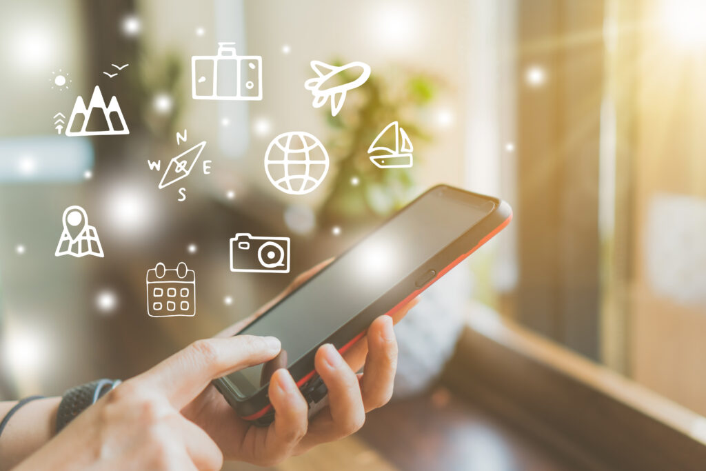 photo of phone with various illustrated icons floating around it.