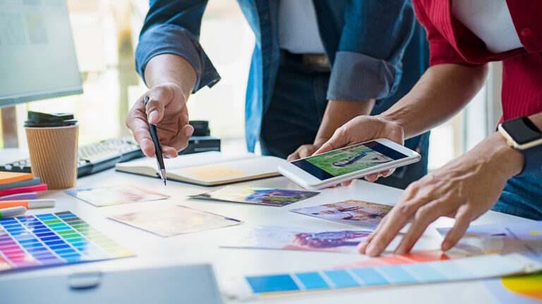 Two people planning for launching a successful digital campaign.