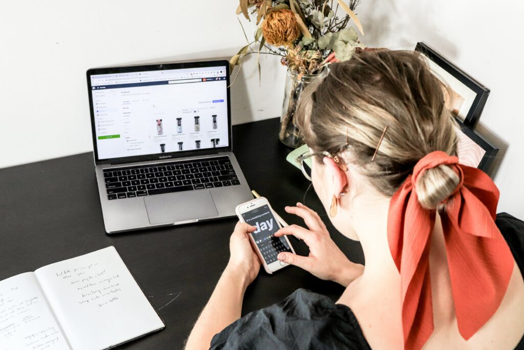 woman reviewing social media post and branding